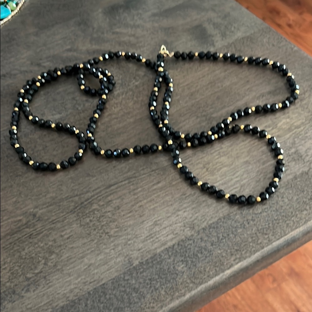 Elegant Black Beaded Necklace with Gold Accent